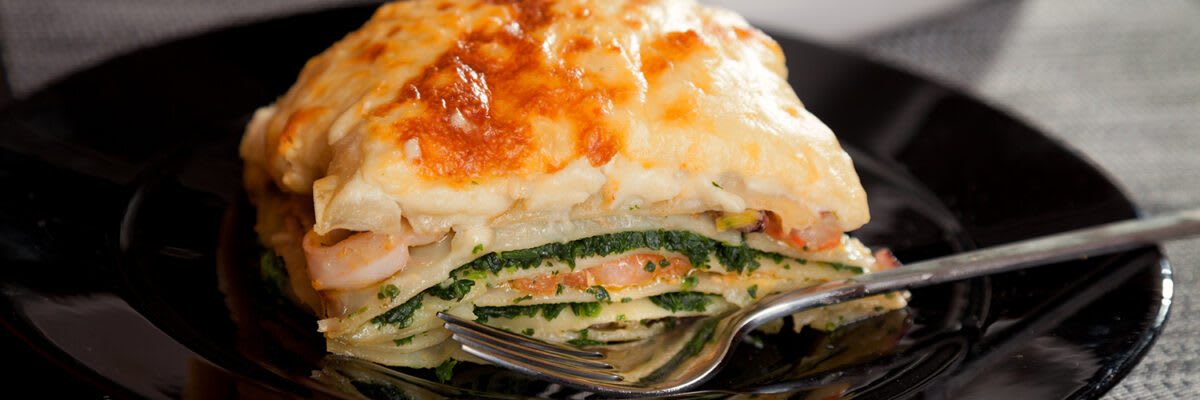Lasagne met zalm en spinazie uit de oven